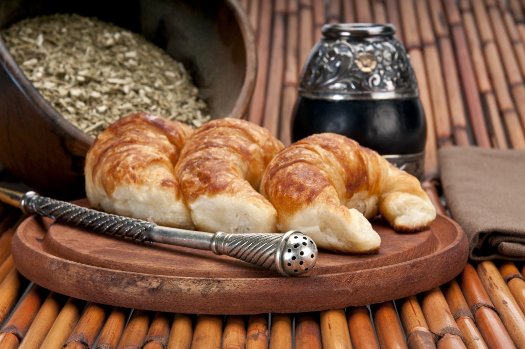 Yerba Mate and Croissants, this is a typical drink and breakfast in Argentine. Use of selective focus.